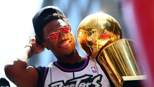 TORONTO, ON - JUNE 17: Kyle Lowry #7 of the Toronto Raptors holds the championship trophy during the Toronto Raptors Victory Parade on June 17, 2019 in Toronto, Canada. The Toronto Raptors beat the Golden State Warriors 4-2 to win the 2019 NBA Finals.