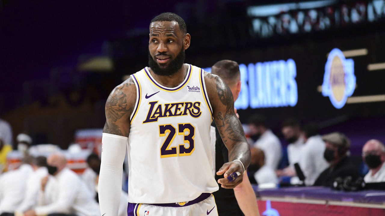LOS ANGELES, CA - FEBRUARY 28: LeBron James #23 of the Los Angeles Lakers looks on during the game against the Golden State Warriors on February 28, 2021 at STAPLES Center in Los Angeles, California. NOTE TO USER: User expressly acknowledges and agrees that, by downloading and/or using this Photograph, user is consenting to the terms and conditions of the Getty Images License Agreement. Mandatory Copyright Notice: Copyright 2021 NBAE