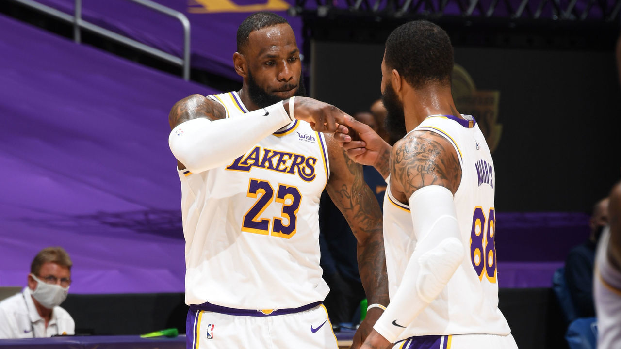 LOS ANGELES, CA - FEBRUARY 28: LeBron James #23 hi-fives Markieff Morris #88 of the Los Angeles Lakers during the game against the Golden State Warriors on February 28, 2021 at STAPLES Center in Los Angeles, California. NOTE TO USER: User expressly acknowledges and agrees that, by downloading and/or using this Photograph, user is consenting to the terms and conditions of the Getty Images License Agreement. Mandatory Copyright Notice: Copyright 2021 NBAE
