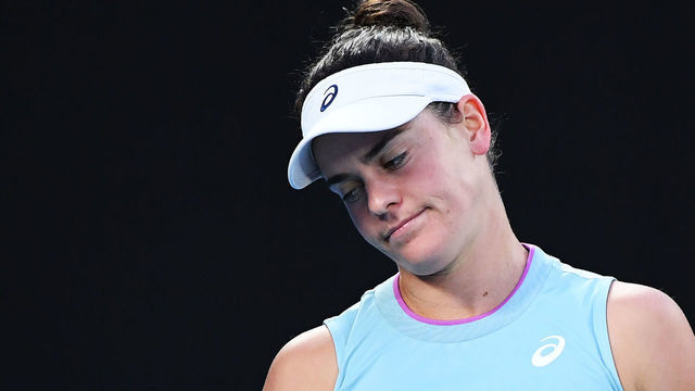 Jennifer Brady of the US reacts after a point against Japan's Naomi Osaka during their women's singles final match on day thirteen of the Australian Open tennis tournament in Melbourne on February 20, 2021.