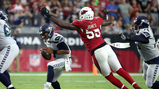 GLENDALE, AZ - SEPTEMBER 30: Defensive end Chandler Jones #55 of the Arizona Cardinals sacks quarterback Russell Wilson #3 of the Seattle Seahawks during the second quarter at State Farm Stadium on September 30, 2018 in Glendale, Arizona.