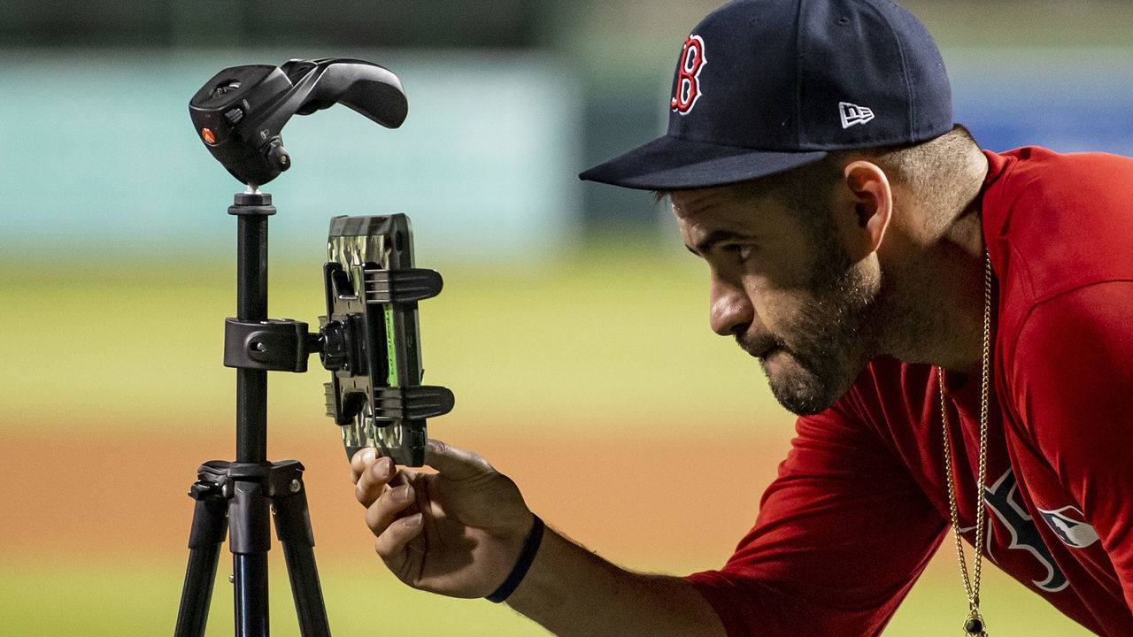 FT. MYERS, FL - FEBRUARY 24: J.D. Martinez #28 of the Boston Red Sox reviews video during the MGM Sox at Sundown spring training team night workout on February 24, 2021 at jetBlue Park at Fenway South in Fort Myers, Florida.