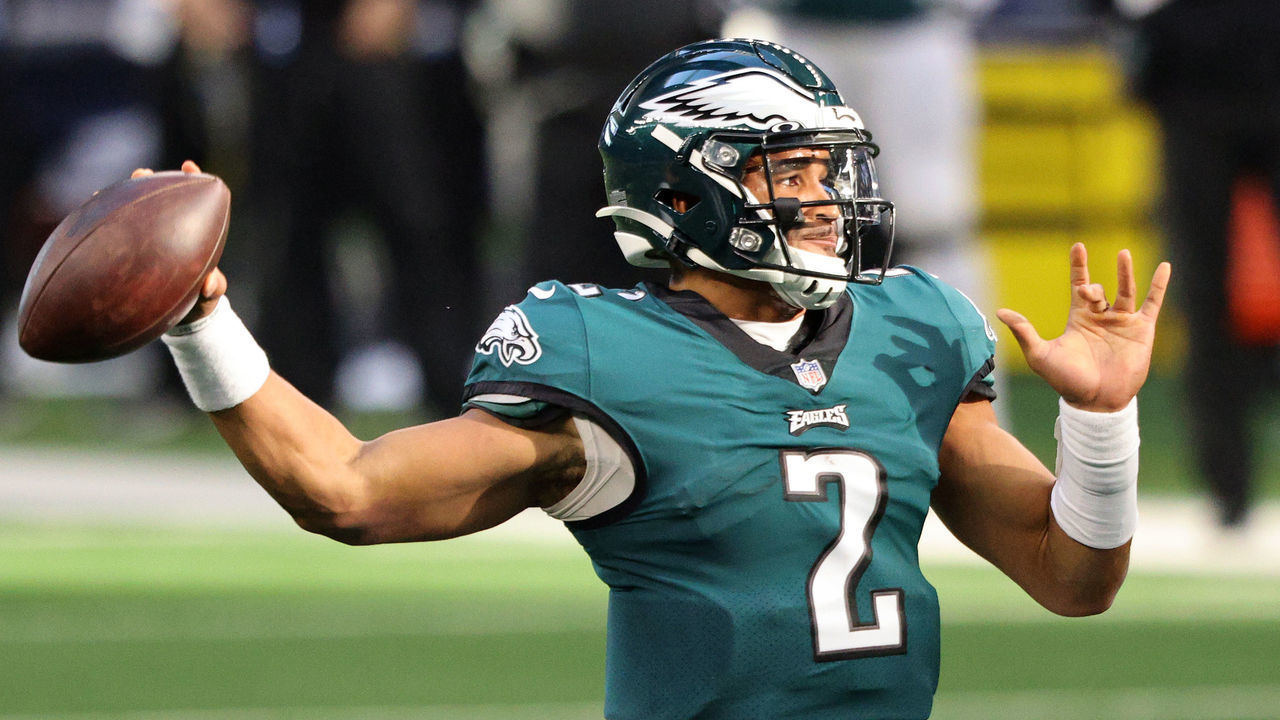 ARLINGTON, TEXAS - DECEMBER 27: Jalen Hurts #2 of the Philadelphia Eagles looks to pass in the first quarter against the Dallas Cowboys at AT&T Stadium on December 27, 2020 in Arlington, Texas.