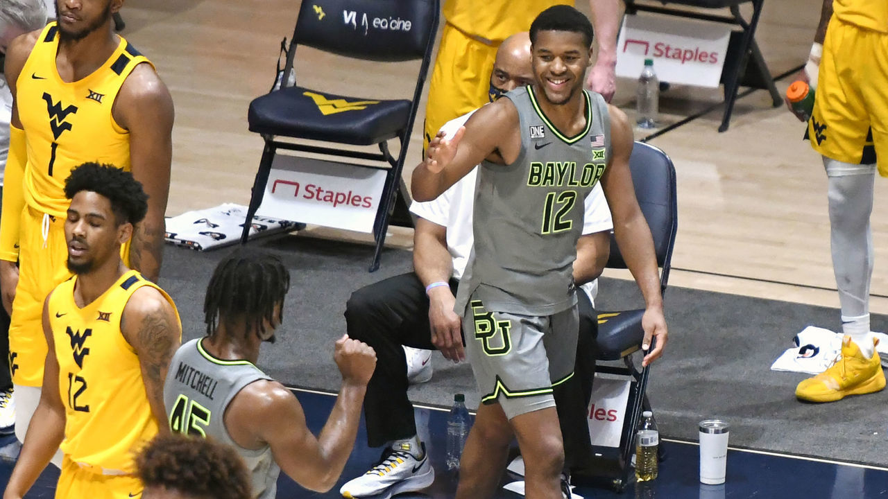 MORGANTOWN, WV - MARCH 02: Jared Butler #12 of the Baylor Bears celebrates a three point at end of the first half during a college basketball game against the West Virginia Mountaineers at WVU Coliseum on March 2, 2021 in Morgantown, West Virginia.