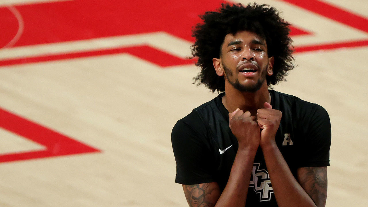 HOUSTON, TEXAS - JANUARY 17: Isaiah Adams #3 of the UCF Knights reacts to a foul called during the first half of a game against the Houston Cougars at Fertitta Center on January 17, 2021 in Houston, Texas.