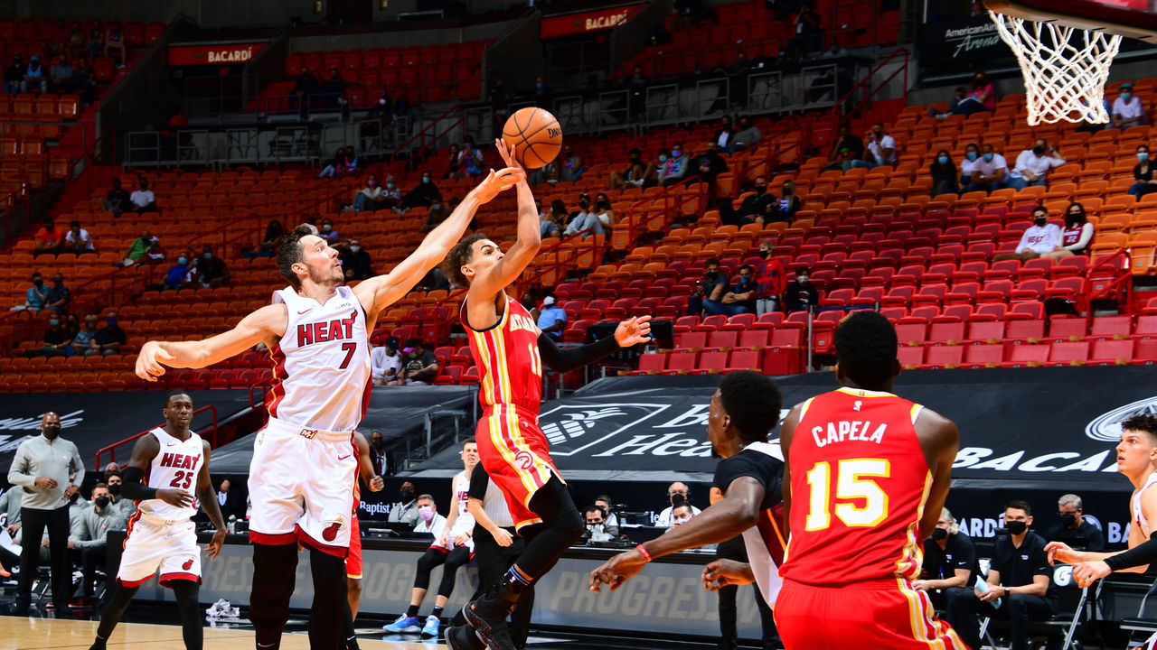 ATLANTA, GA - MARCH 2: Trae Young #11 of the Atlanta Hawks shoots the ball during the game against the Miami Heat on March 2, 2021 at State Farm Arena in Atlanta, Georgia. NOTE TO USER: User expressly acknowledges and agrees that, by downloading and/or using this Photograph, user is consenting to the terms and conditions of the Getty Images License Agreement. Mandatory Copyright Notice: Copyright 2021 NBAE