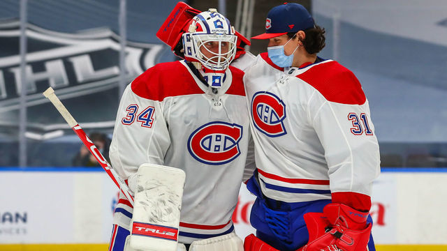 EDMONTON, AB - JANUARY 18: Montreal Canadiens Goalie Jake Allen (34) and Montreal Canadiens Goalie Carey Price (31) celebrate a win in the third period during the Edmonton Oilers game versus the Montreal Canadians on January 18, 2021 at Rogers Place in Edmonton, AB.