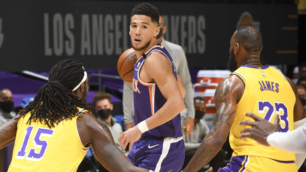 LOS ANGELES, CA - MARCH 2: Devin Booker #1 of the Phoenix Suns handles the ball during the game against the Los Angeles Lakers on March 2, 2021 at STAPLES Center in Los Angeles, California. NOTE TO USER: User expressly acknowledges and agrees that, by downloading and/or using this Photograph, user is consenting to the terms and conditions of the Getty Images License Agreement. Mandatory Copyright Notice: Copyright 2021 NBAE