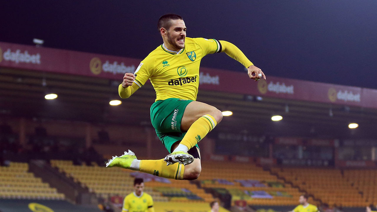 NORWICH, ENGLAND - MARCH 03: Emi Buendia of Norwich City celebrates after scoring their team's first goal during the Sky Bet Championship match between Norwich City and Brentford at Carrow Road on March 03, 2021 in Norwich, England. Sporting stadiums around the UK remain under strict restrictions due to the Coronavirus Pandemic as Government social distancing laws prohibit fans inside venues resulting in games being played behind closed doors.
