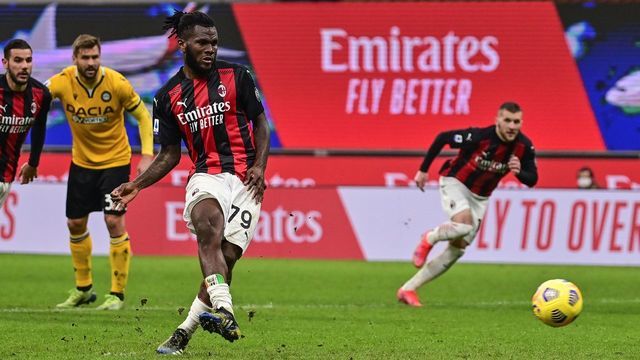 AC Milan's Ivorian midfielder Franck Kessie shoots to score a last minute penalty during the Italian Serie A football match AC Milan vs Udinese on March 03, 2021 at the San Siro stadium in Milan.