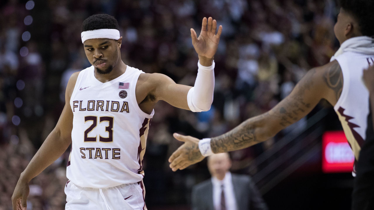TALLAHASSEE, FL - FEBRUARY 24: Florida State guard M.J. Walker (23) high fives his teammates during the game between the Louisville Cardinals and the Florida State Seminoles at the Donald L. Tucker Center in Tallahassee, FL on February 24th, 2020.