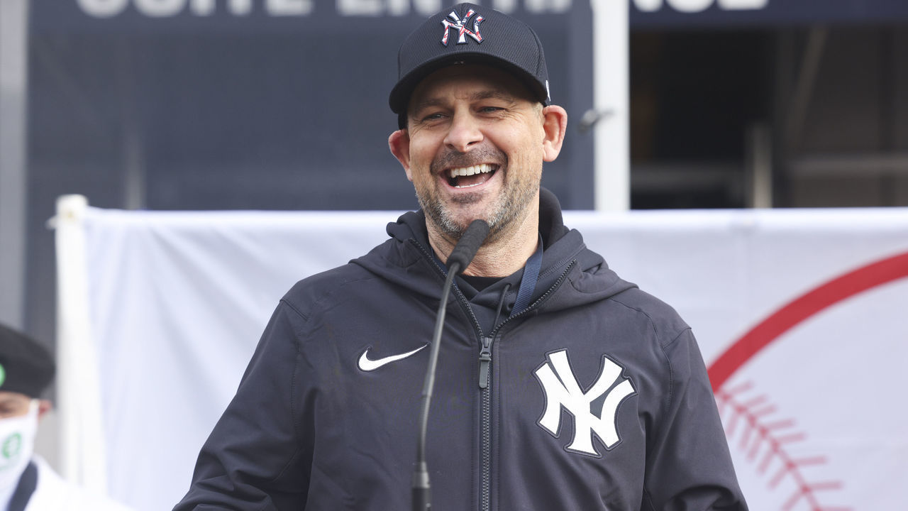 Aaron Boone, manager of the New York Yankees, speaks during a news conference outside a Covid-19 vaccination hub inside Yankee Stadium in the Bronx borough of New York, U.S., on Friday, Feb. 5, 2021. Restaurant workers, taxi drivers and workers at developmentally-disabled facilities could become eligible to receive Covid-19 vaccines if local governments choose to include them, Governor Cuomo said. Photographer: Angus Mordant/Bloomberg via Getty Images