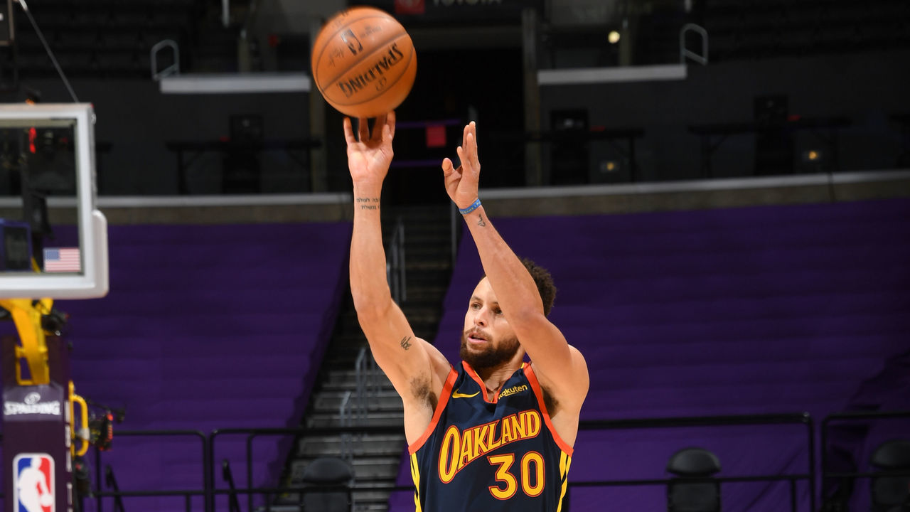 LOS ANGELES, CA - FEBRUARY 28: Stephen Curry #30 of the Golden State Warriors shoots a three point basket during the game against the Los Angeles Lakers on February 28, 2021 at STAPLES Center in Los Angeles, California. NOTE TO USER: User expressly acknowledges and agrees that, by downloading and/or using this Photograph, user is consenting to the terms and conditions of the Getty Images License Agreement. Mandatory Copyright Notice: Copyright 2021 NBAE