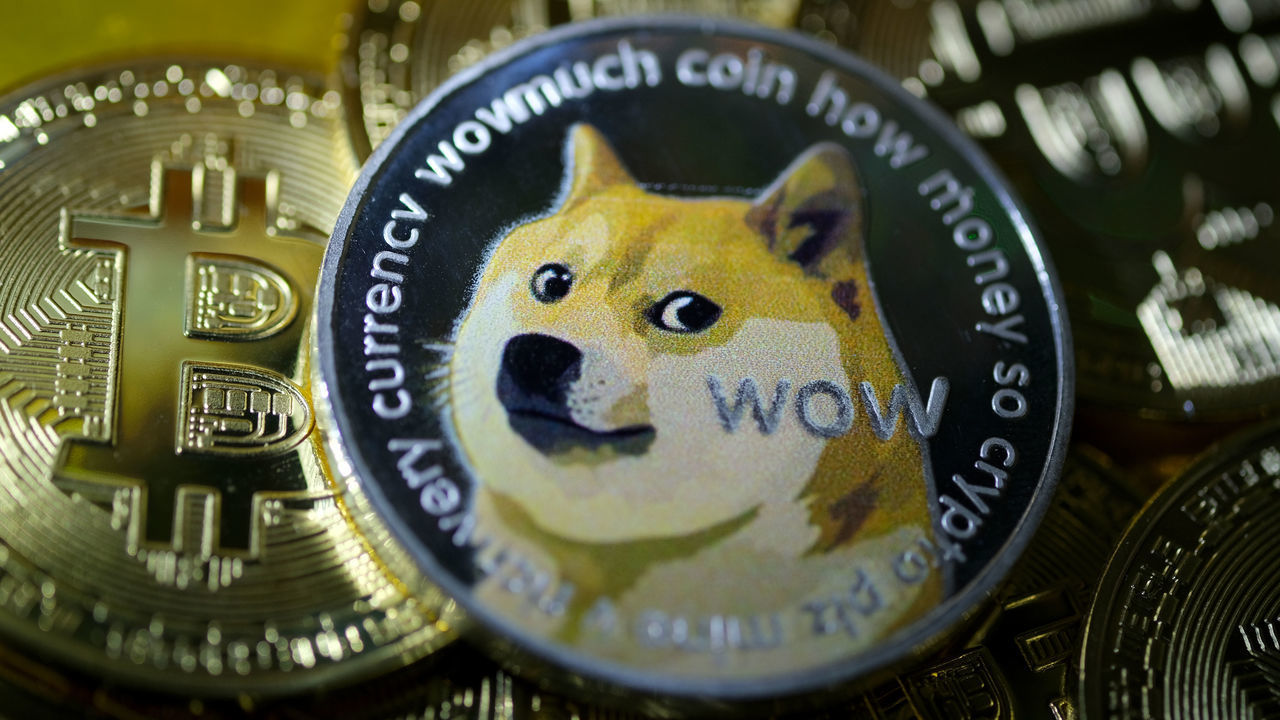 KATWIJK, NETHERLANDS - JANUARY 29: In this photo illustration, visual representations of digital cryptocurrencies, Dogecoin and Bitcoin are arranged on January 29, 2021 in Katwijk, Netherlands.