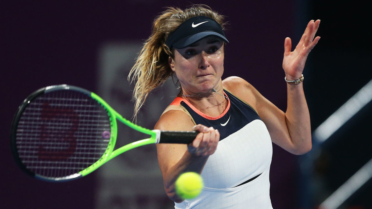 DOHA, QATAR - MARCH 04: Elina Svitolina of Ukraine plays a forehand in her Quarter-Final singles match against Victoria Azarenka of Belarus during Day Four of the Qatar Total Open 2021 at Khalifa International Tennis and Squash Complex on March 04, 2021 in Doha, Qatar.