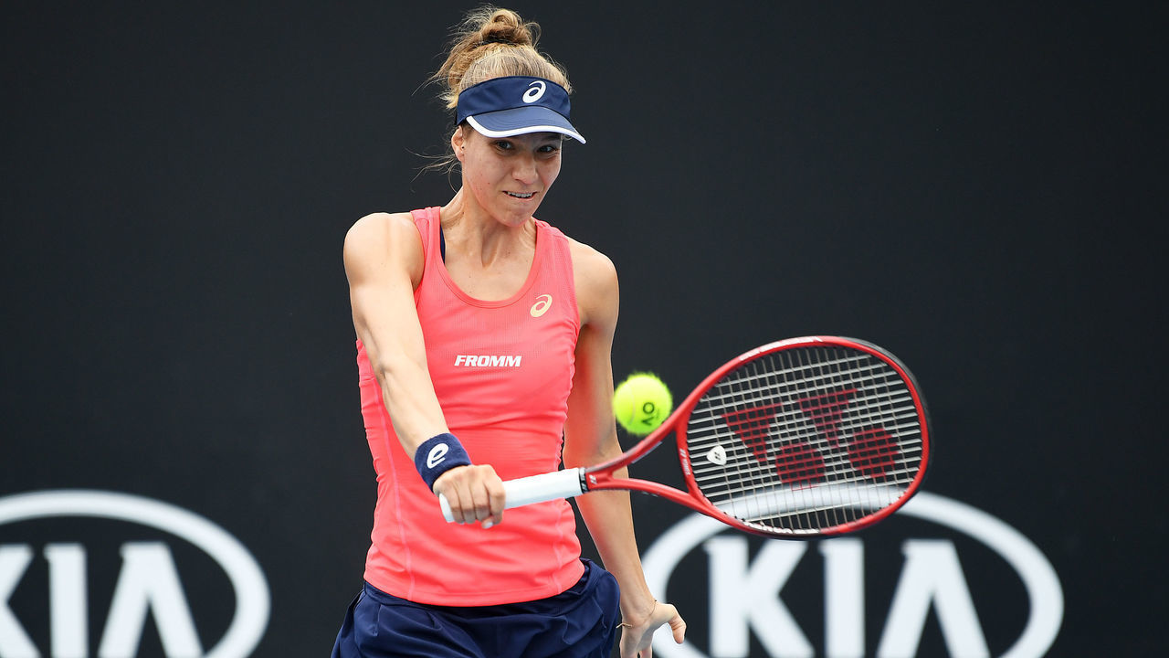 MELBOURNE, AUSTRALIA - JANUARY 20: Viktorija Golubic of Switzerland plays a backhand during her Women's Singles first round match against Lin Zhu of China on day one of the 2020 Australian Open at Melbourne Park on January 20, 2020 in Melbourne, Australia.