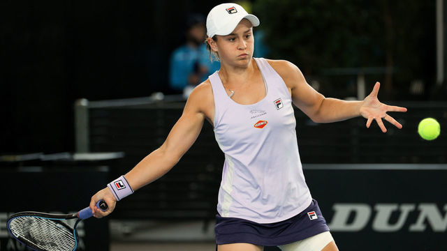 ADELAIDE, AUSTRALIA - FEBRUARY 24: Ash Barty of Australia plays a shot against Danielle Collins of United States during their singles match on day three of the Adelaide International tennis tournament at Memorial Drive on February 24, 2021 in Adelaide, Australia.