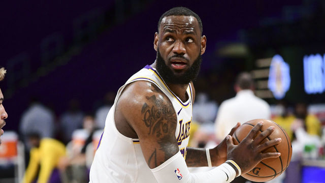LOS ANGELES, CA - FEBRUARY 28: LeBron James #23 of the Los Angeles Lakers handles the ball during the game against the Golden State Warriors on February 28, 2021 at STAPLES Center in Los Angeles, California. NOTE TO USER: User expressly acknowledges and agrees that, by downloading and/or using this Photograph, user is consenting to the terms and conditions of the Getty Images License Agreement. Mandatory Copyright Notice: Copyright 2021 NBAE