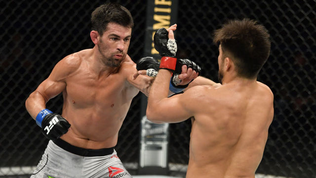 JACKSONVILLE, FLORIDA - MAY 09: (L-R) Dominick Cruz punches Henry Cejudo in their UFC bantamweight championship fight during the UFC 249 event at VyStar Veterans Memorial Arena on May 09, 2020 in Jacksonville, Florida.