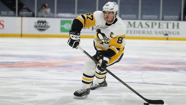 UNIONDALE, NEW YORK - FEBRUARY 28: Sidney Crosby #87 of the Pittsburgh Penguins skates with the puck against the New York Islanders during their game at Nassau Coliseum on February 28, 2021 in Uniondale, New York.