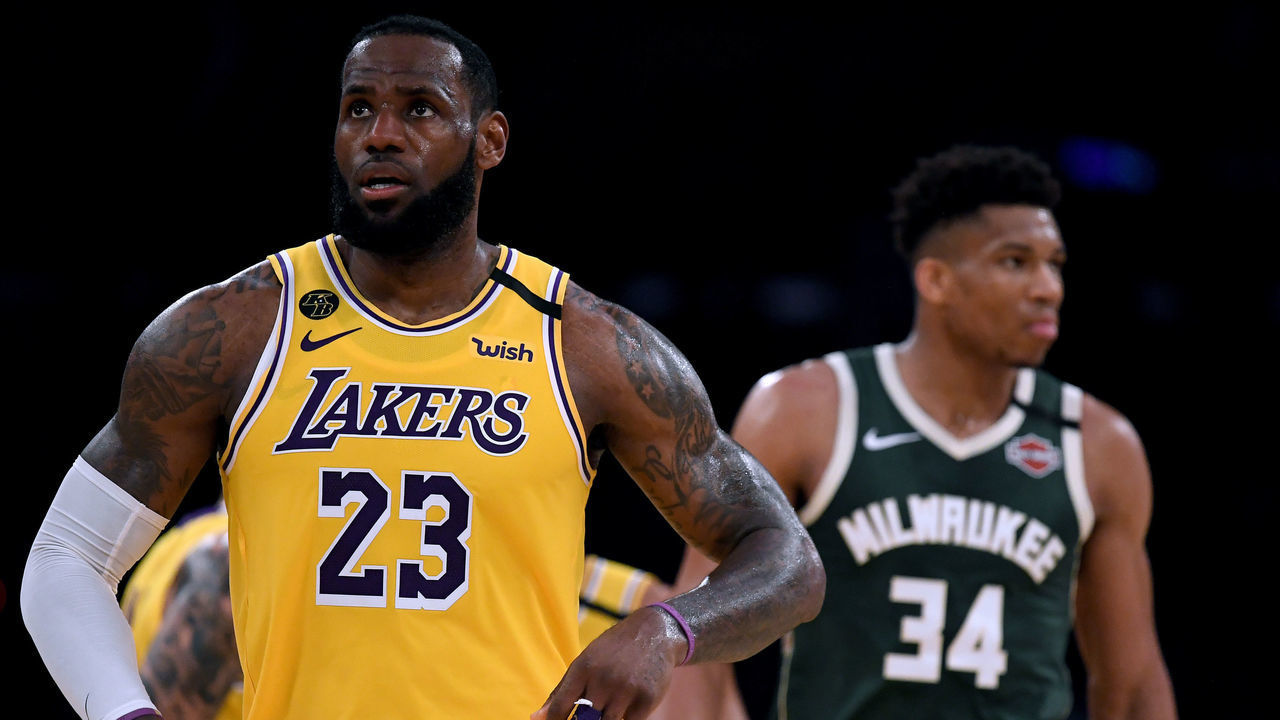 LOS ANGELES, CALIFORNIA - MARCH 06: LeBron James #23 of the Los Angeles Lakers reacts after his basket in front of Giannis Antetokounmpo #34 of the Milwaukee Bucks at Staples Center on March 06, 2020 in Los Angeles, California.