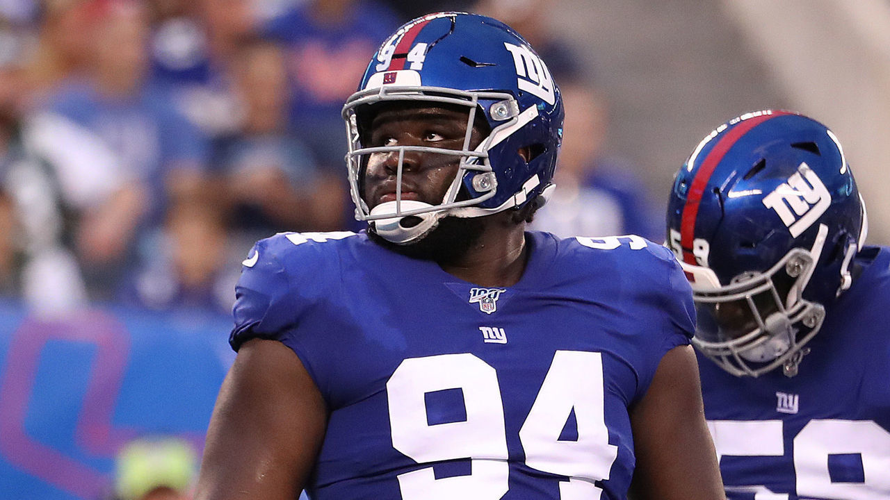 EAST RUTHERFORD, NEW JERSEY - AUGUST 08: Dalvin Tomlinson #94 of the New York Giants looks on against the New York Jets during their Pre Season game at MetLife Stadium on August 08, 2019 in East Rutherford, New Jersey.