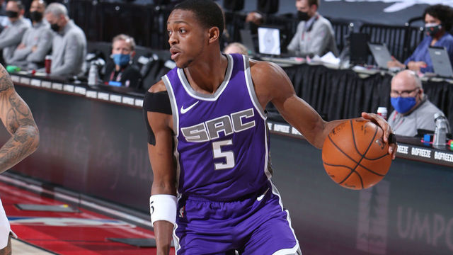 PORTLAND, OR - MARCH 4: De'Aaron Fox #5 of the Sacramento Kings dribbles the ball during the game against the Portland Trail Blazers on March 4, 2021 at the Moda Center Arena in Portland, Oregon. Mandatory Copyright Notice: Copyright 2021 NBAE
