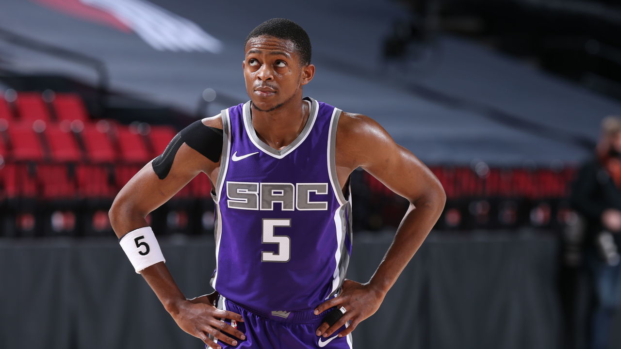 PORTLAND, OR - MARCH 4: De'Aaron Fox #5 of the Sacramento Kings looks on during the game against the Portland Trail Blazers on March 4, 2021 at the Moda Center Arena in Portland, Oregon. Mandatory Copyright Notice: Copyright 2021 NBAE