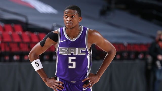 PORTLAND, OR - MARCH 4: De'Aaron Fox #5 of the Sacramento Kings looks on during the game against the Portland Trail Blazers on March 4, 2021 at the Moda Center Arena in Portland, Oregon. Mandatory Copyright Notice: Copyright 2021 NBAE