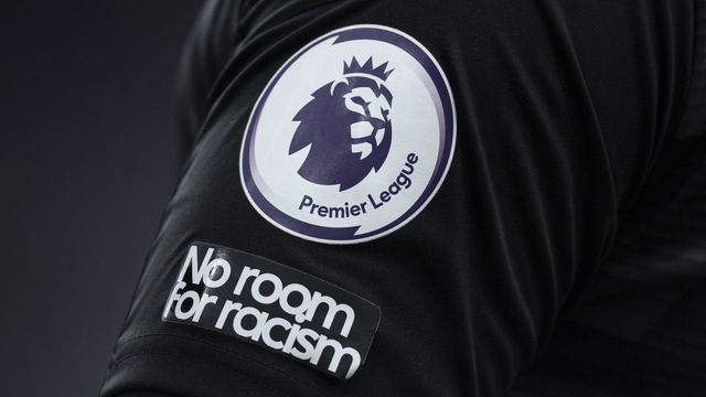 BURNLEY, ENGLAND - FEBRUARY 20: The Anti-racist message 'No Room For Racism' displayed alongside the Premier League logo on the sleeve of West Bromwich Albion goalkeeper Sam Johnstone during the Premier League match between Burnley and West Bromwich Albion at Turf Moor on February 20, 2021 in Burnley, United Kingdom. Sporting stadiums around the UK remain under strict restrictions due to the Coronavirus Pandemic as Government social distancing laws prohibit fans inside venues resulting in games being played behind closed doors.