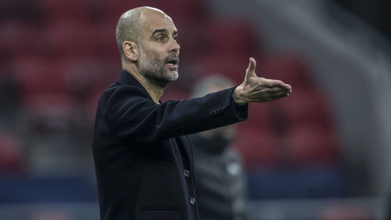 BUDAPEST, HUNGARY - FEBRUARY 24: Headcoach Pep Guardiola pf Manchester City in action during the UEFA Champions League Round Of 16 Leg One match between Borussia Moenchengladbach and Manchester City at Puskas Arena on February 24, 2021 in Budapest, Hungary. Moenchengladbach face Manchester City at a neutral venue in Budapest behind closed doors after Germany imposed a ban on travellers arriving from the UK in an effort to prevent the spread of Covid-19 variants.
