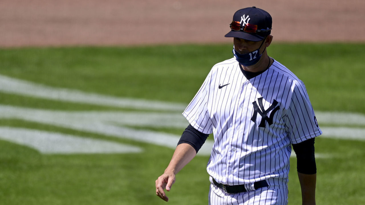 TAMPA, FLORIDA - FEBRUARY 28: Manager Aaron Boone of the New York Yankees walks on the field prior to the game against the Toronto Blue Jays during a spring training game at George M. Steinbrenner Field on February 28, 2021 in Tampa, Florida.