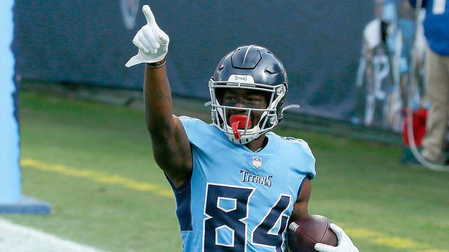 NASHVILLE, TENNESSEE - DECEMBER 06: Corey Davis #84 of the Tennessee Titans celebrates a touchdown against the Cleveland Browns in the second quarter at Nissan Stadium on December 06, 2020 in Nashville, Tennessee.
