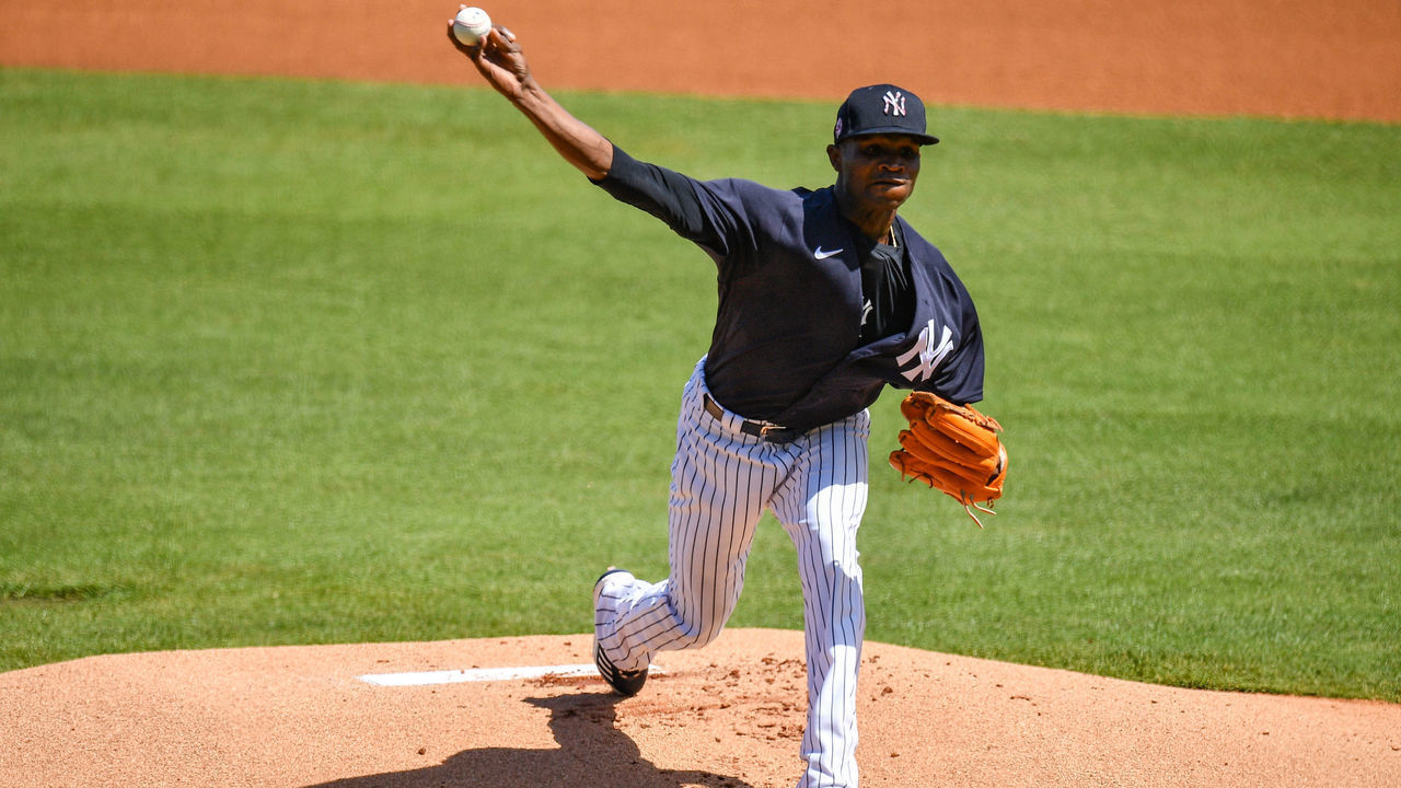 TAMPA, FLORIDA - MARCH 05: Domingo Germán #55 of the New York Yankees delivers a pitch in the first inning against the Detroit Tigers in a spring training game at George M. Steinbrenner Field on March 05, 2021 in Tampa, Florida.