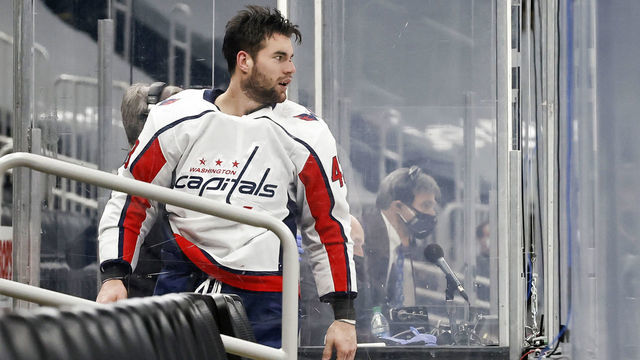 BOSTON, MA - MARCH 05: Washington Capitals right wing Tom Wilson (43) enters the penalty box during a game between the Boston Bruins and the Washington Capitals on March 5, 2021, at TD Garden in Boston, Massachusetts.
