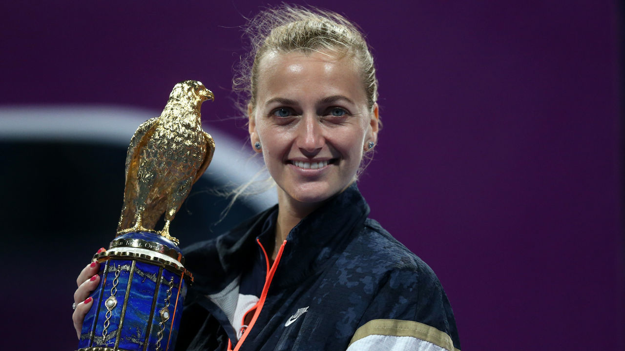 DOHA, QATAR - MARCH 06: Petra Kvitova of The Czech Republic celebrates with the trophy after victory against Garbine Muguruza of Spain during Day Six of the Qatar Total Open 2021 at Khalifa International Tennis and Squash Complex on March 06, 2021 in Doha, Qatar.