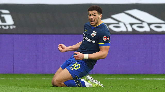 SHEFFIELD, ENGLAND - MARCH 06: Che Adams of celebrates after scoring his teams second goal during the Premier League match between Sheffield United and Southampton at Bramall Lane on March 06, 2021 in Sheffield, England. Sporting stadiums around the UK remain under strict restrictions due to the Coronavirus Pandemic as Government social distancing laws prohibit fans inside venues resulting in games being played behind closed doors
