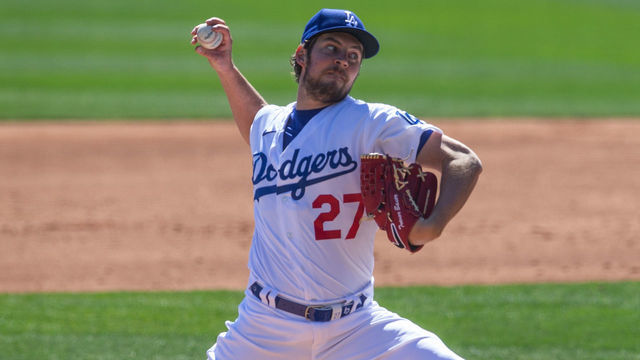 GLENDALE, AZ - MARCH 01: Trevor Bauer #27 of the Los Angeles Dodgers pitches during a spring training game against the Colorado Rockies at Camelback Ranch on March 1, 2021 in Glendale, Arizona.