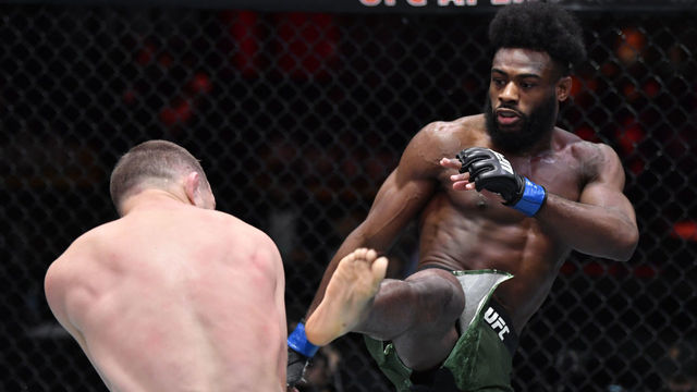 LAS VEGAS, NEVADA - MARCH 06: (R-L) Aljamain Sterling kicks Petr Yan of Russia in their UFC bantamweight championship fight during the UFC 259 event at UFC APEX on March 06, 2021 in Las Vegas, Nevada.