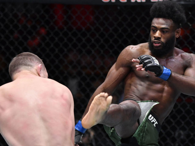 LAS VEGAS, NEVADA - MARCH 06: (R-L) Aljamain Sterling kicks Petr Yan of Russia in their UFC bantamweight championship fight during the UFC 259 event at UFC APEX on March 06, 2021 in Las Vegas, Nevada.