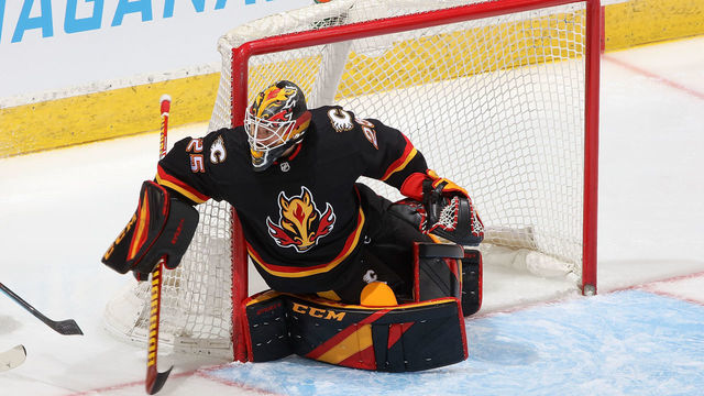 CALGARY, AB - FEBRUARY 17: Jacob Markstrom #25 of the Calgary Flames makes a save against the Vancouver Canucks at Scotiabank Saddledome on February 17, 2021 in Calgary, Alberta, Canada.