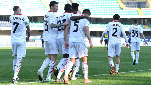 VERONA, ITALY - MARCH 07: Diogo Dalot of AC Milan celebrates with Alessio Romagnoli, Fikayo Tomori and team mates after scoring their side's second goal during the Serie A match between Hellas Verona FC and AC Milan at Stadio Marcantonio Bentegodi on March 07, 2021 in Verona, Italy. Sporting stadiums around Italy remain under strict restrictions due to the Coronavirus Pandemic as Government social distancing laws prohibit fans inside venues resulting in games being played behind closed doors.