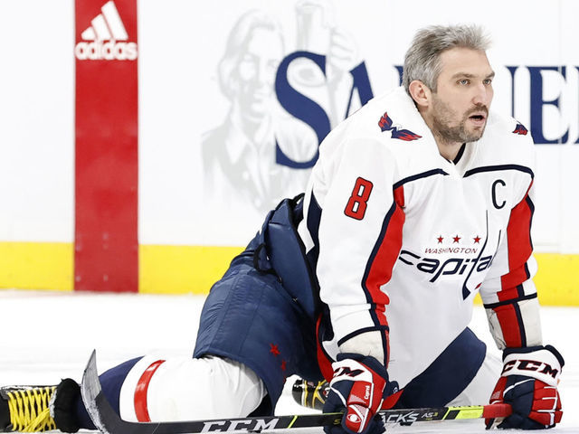 BOSTON, MA - MARCH 05: Washington Capitals left wing Alex Ovechkin (8) stretches out in warm up before a game between the Boston Bruins and the Washington Capitals on March 5, 2021, at TD Garden in Boston, Massachusetts.