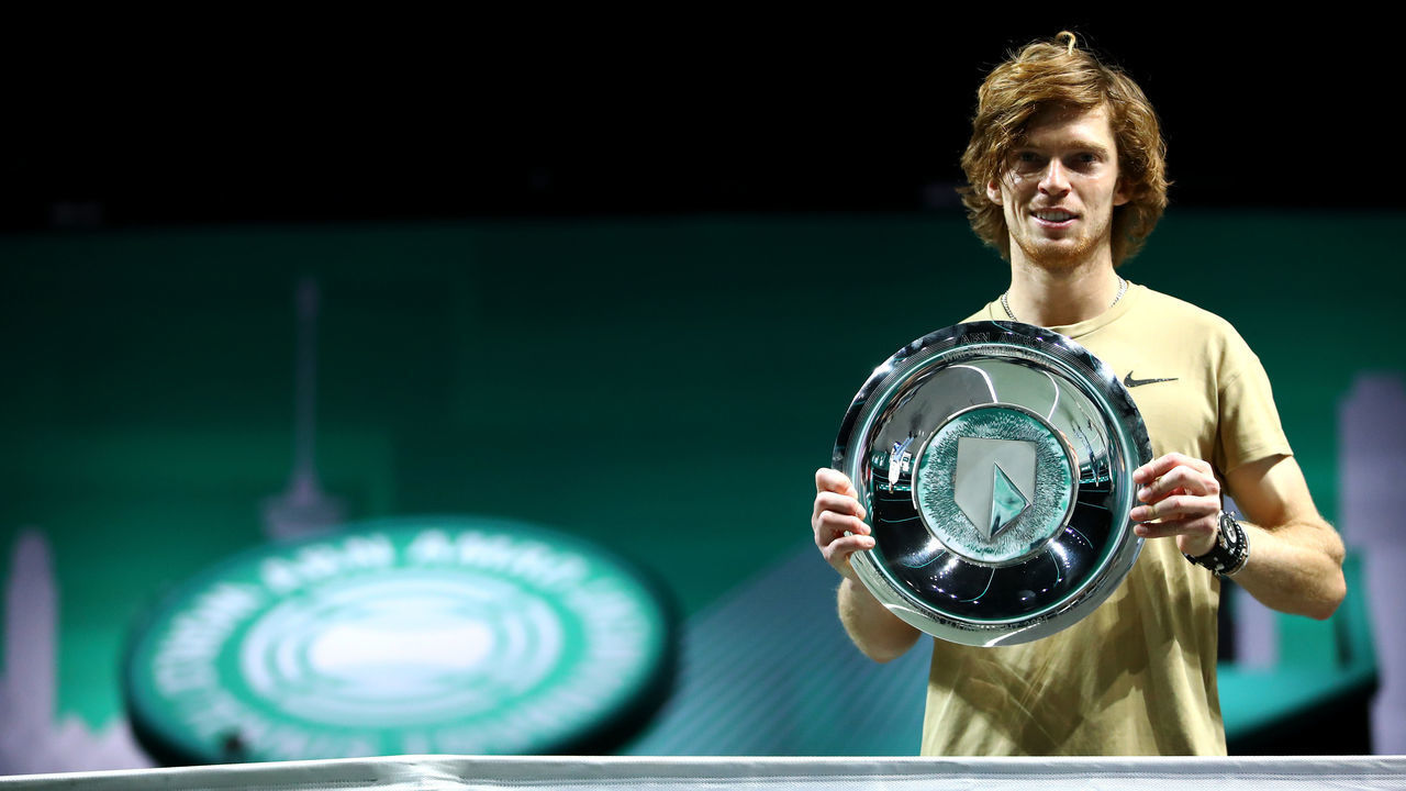 ROTTERDAM, NETHERLANDS - MARCH 07: Andrey Rublev of Russia celebrates winning the Mens Final match against Marton Fucsovics of Hungary with the trophy or plate during Day 7 of the 48th ABN AMRO World Tennis Tournament at Ahoy on March 07, 2021 in Rotterdam, Netherlands.