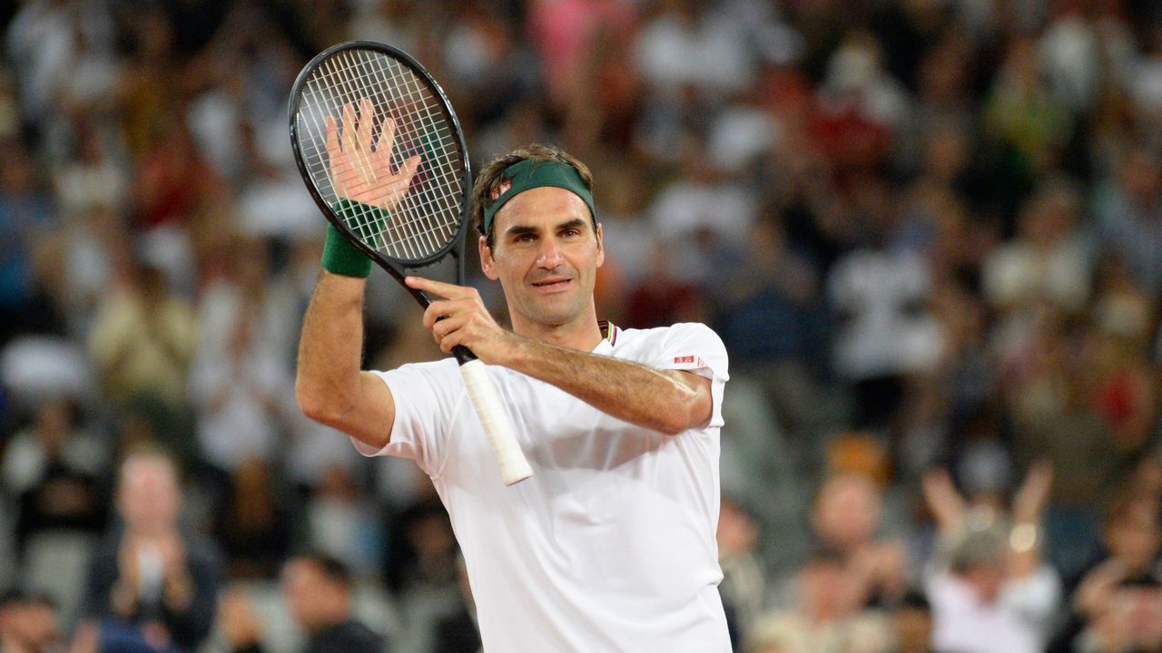 TOPSHOT - Switzerland's Roger Federer reacts after his victory against Spain's Rafael Nadal during their tennis match at The Match in Africa at the Cape Town Stadium, in Cape Town on February 7, 2020.