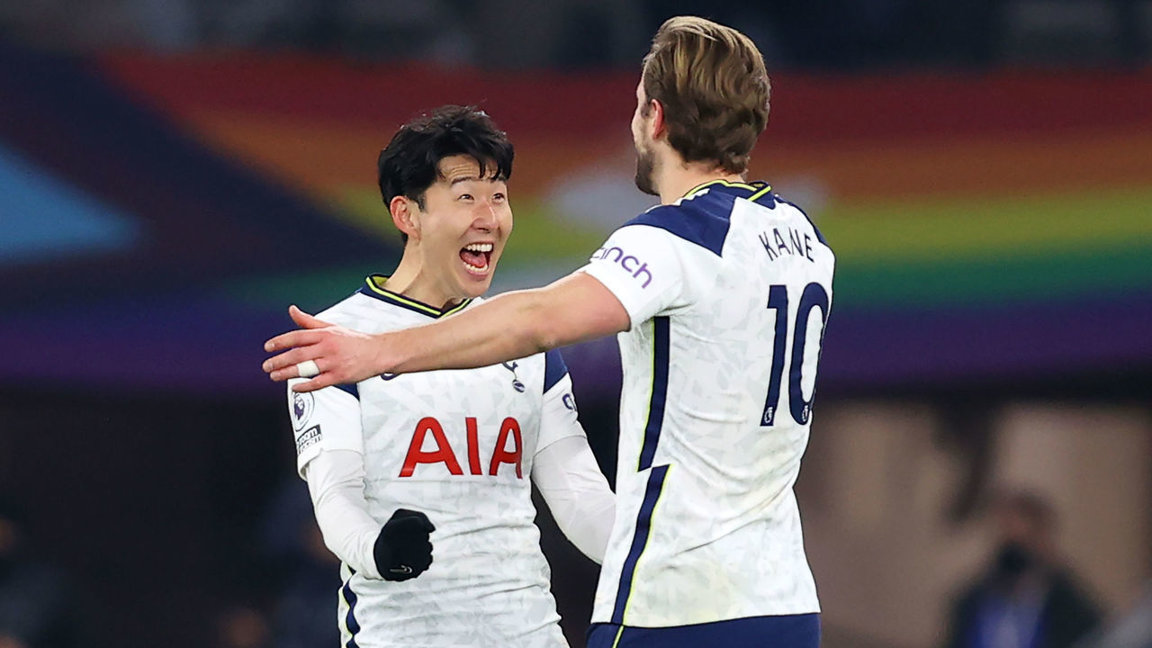 Tottenham Hotspur's English striker Harry Kane (R) celebrates with Tottenham Hotspur's South Korean striker Son Heung-Min (L) after scoring their fourth goal during the English Premier League football match between Tottenham Hotspur and Crystal Palace at Tottenham Hotspur Stadium in London, on March 7, 2021.