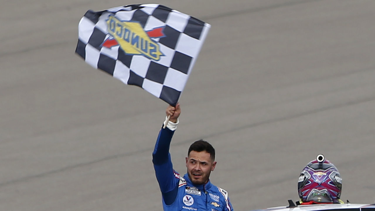 LAS VEGAS, NEVADA - MARCH 07: Kyle Larson, driver of the #5 HendrickCars.com Chevrolet, celebrates with the checkered flag after winning the NASCAR Cup Series Pennzoil 400 presented by Jiffy Lube at the Las Vegas Motor Speedway on March 07, 2021 in Las Vegas, Nevada.