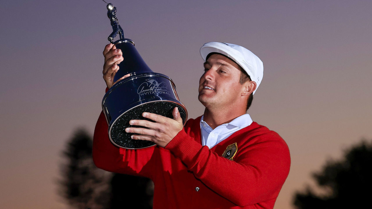 ORLANDO, FLORIDA - MARCH 07: Bryson DeChambeau of the United States celebrates with the trophy after winning during the final round of the Arnold Palmer Invitational Presented by MasterCard at the Bay Hill Club and Lodge on March 07, 2021 in Orlando, Florida.