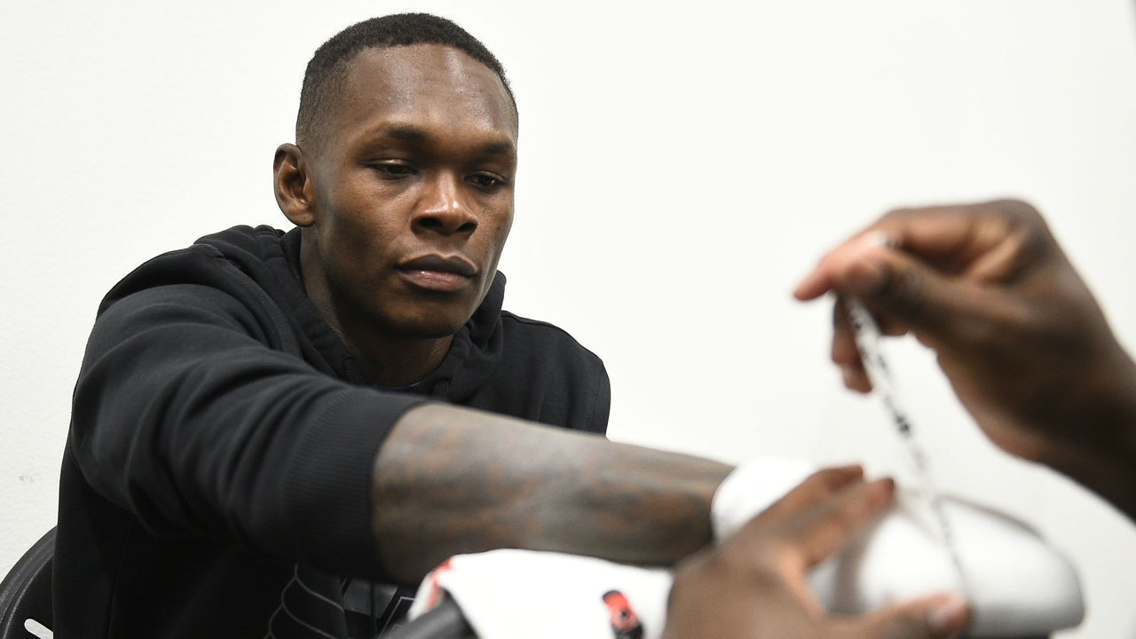 LAS VEGAS, NEVADA - MARCH 06: Israel Adesanya of Nigeria has his hands wrapped prior to his fight during the UFC 259 event at UFC APEX on March 06, 2021 in Las Vegas, Nevada.