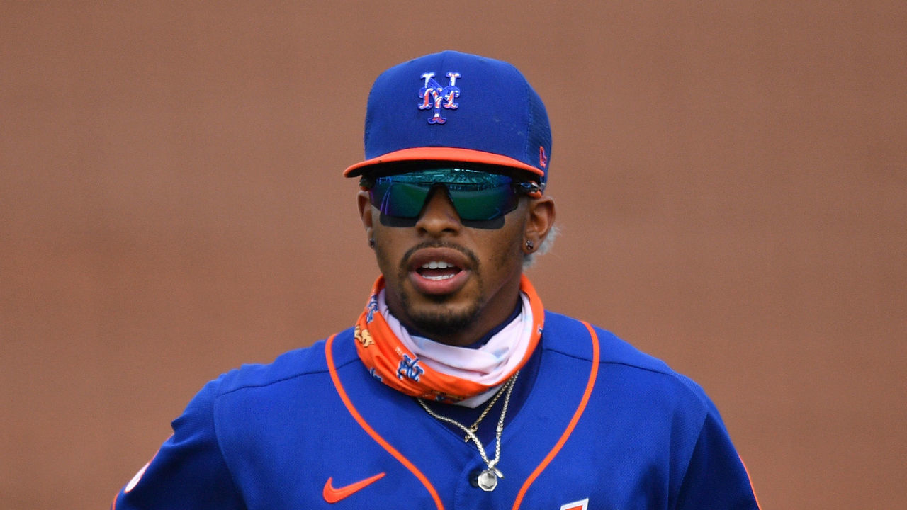 JUPITER, FLORIDA - MARCH 01: Francisco Lindor #12 of the New York Mets runs back to the duggout in the second inning against the Miami Marlins in a spring training game at Roger Dean Chevrolet Stadium on March 01, 2021 in Jupiter, Florida.
